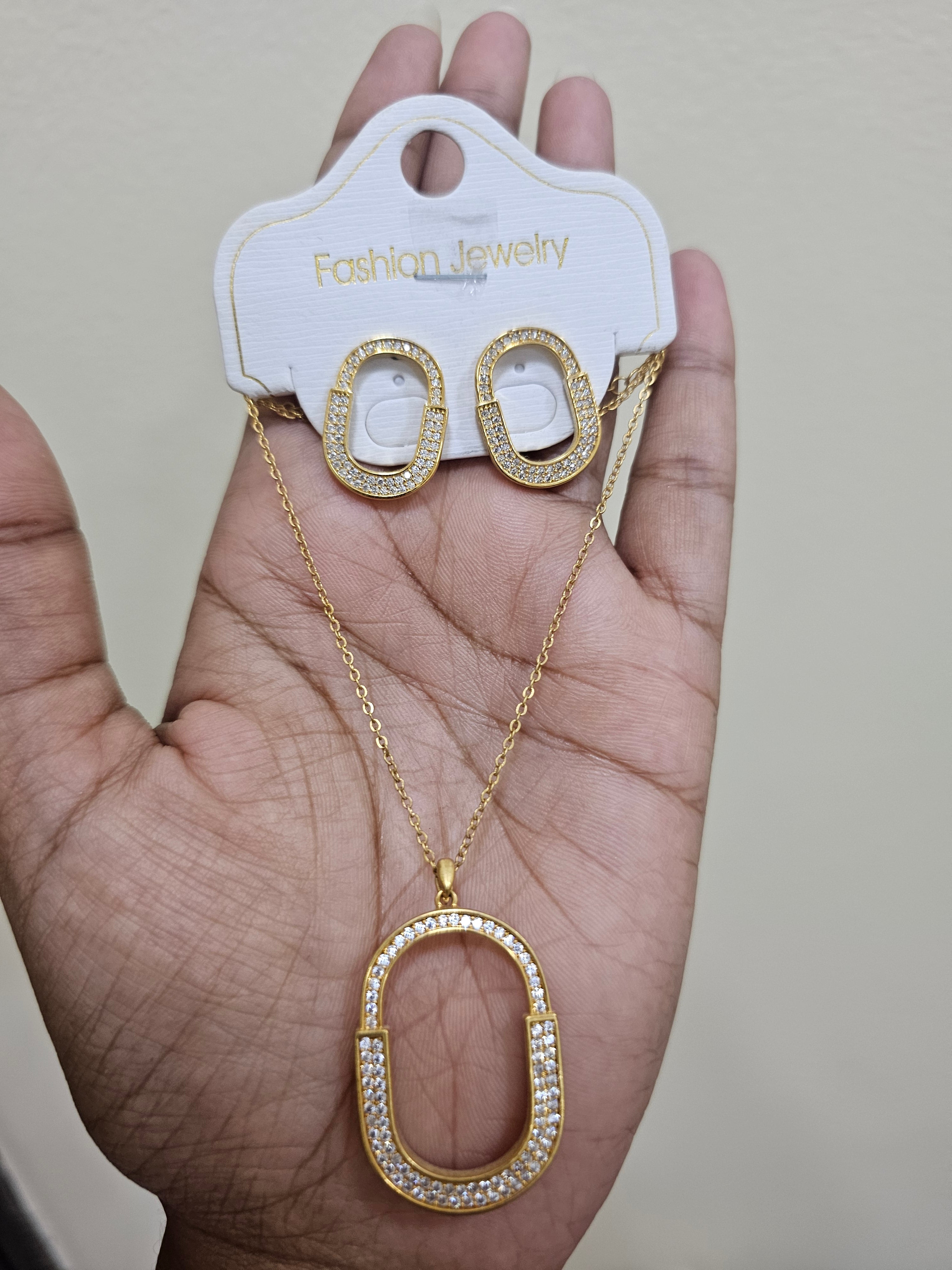 Oval CZ halo pendant set