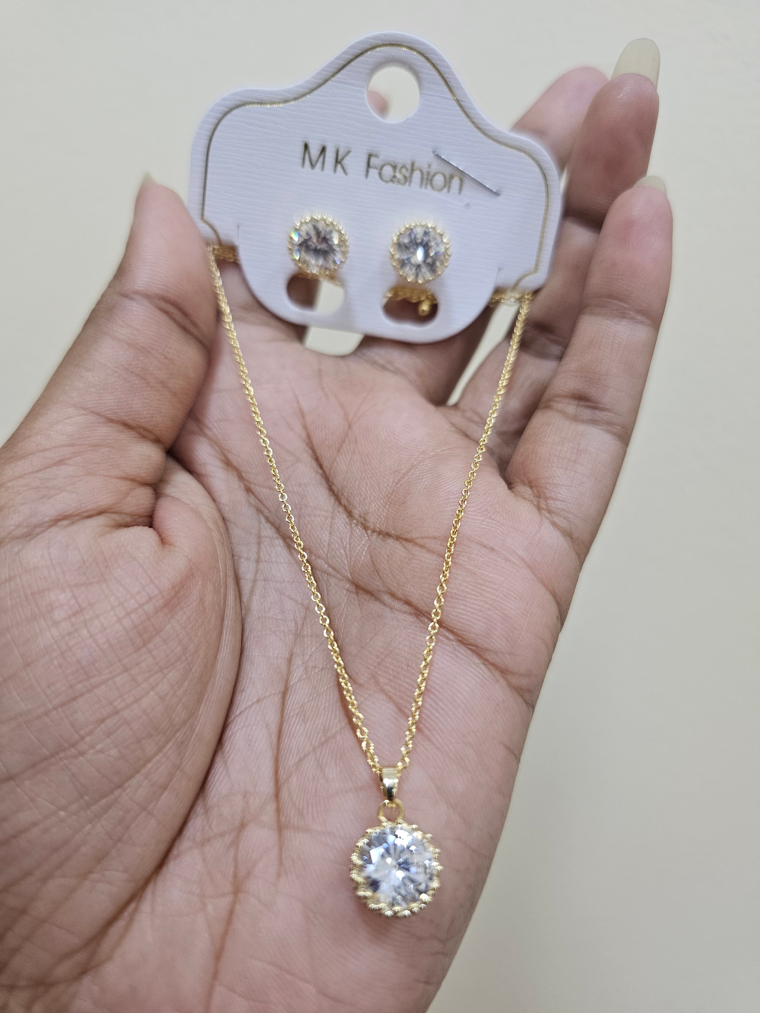 Round CZ solitaire halo pendant set
