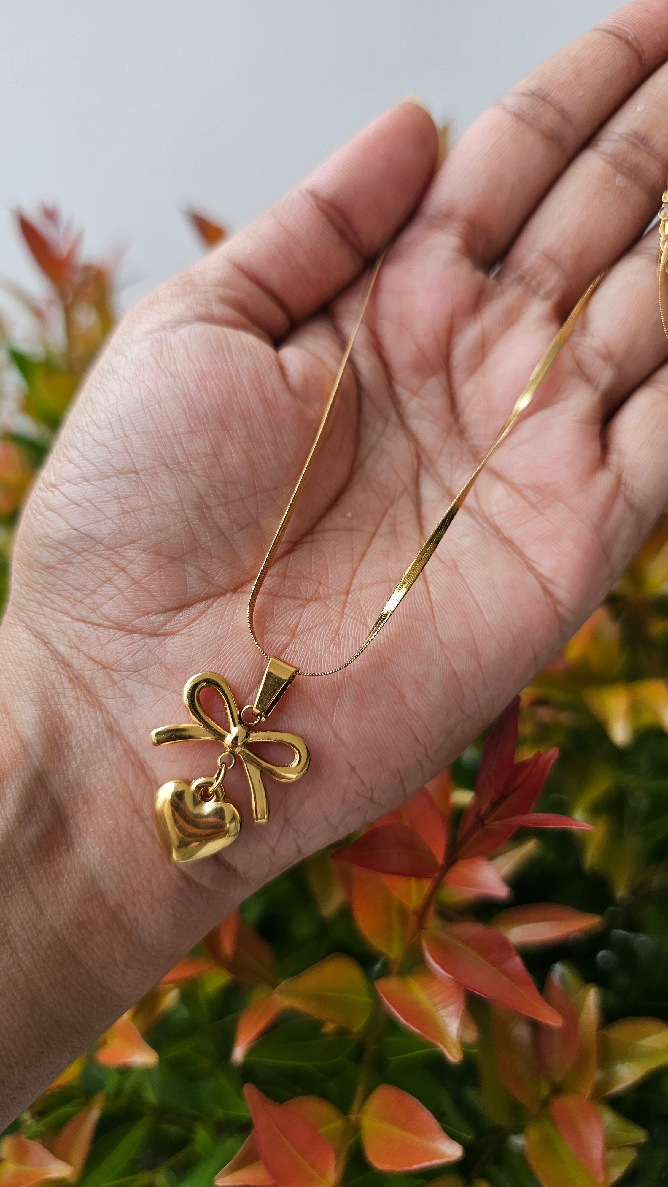 Bow heart pendant chain