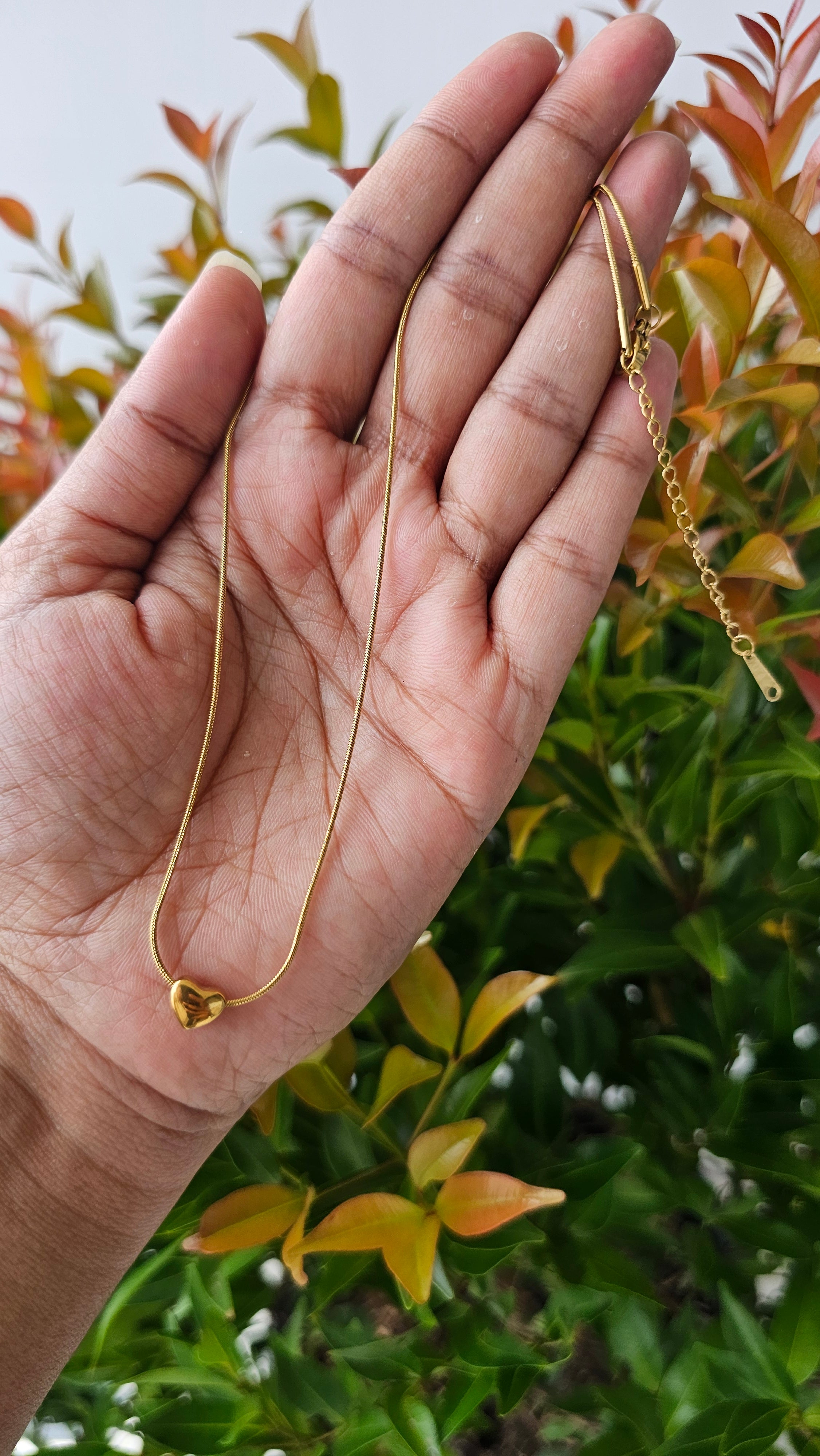 Tiny gold heart pendant chain