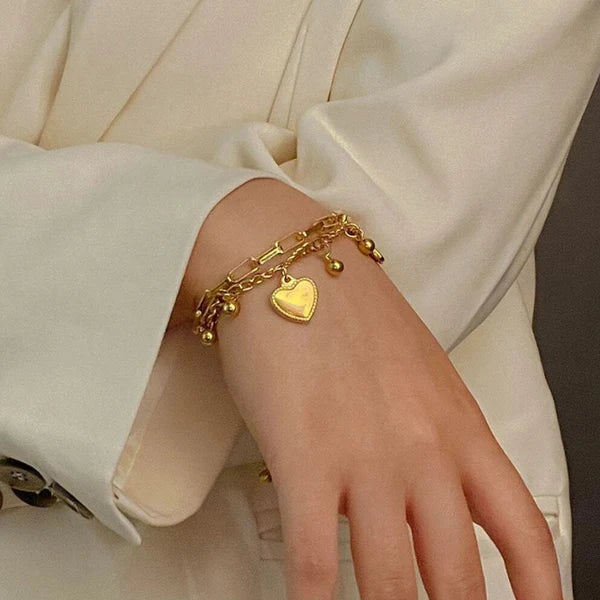 Gold plated stainless steel anti tarnish heart themed wraparound bracelet for women