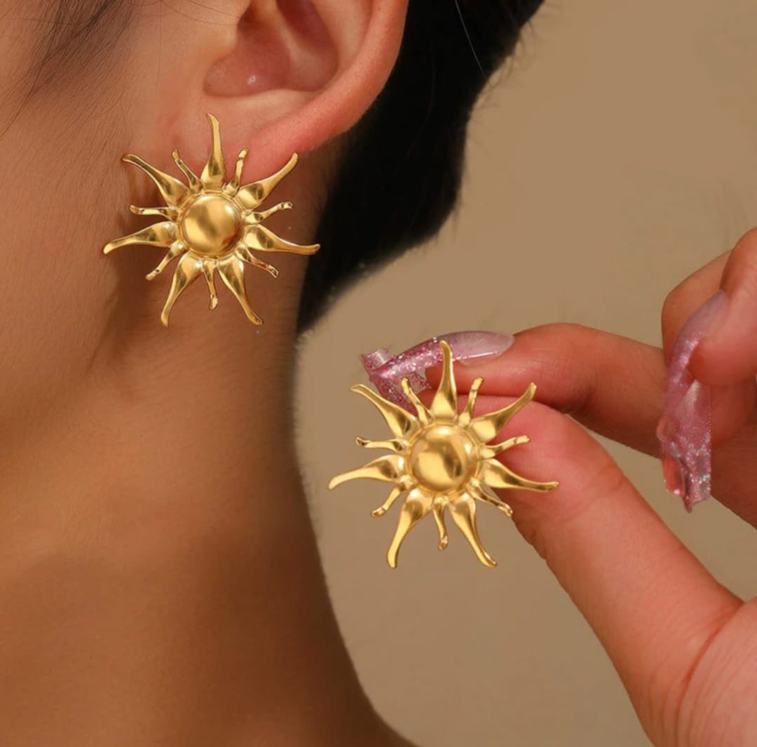 Golden sunburst statement stud earrings
