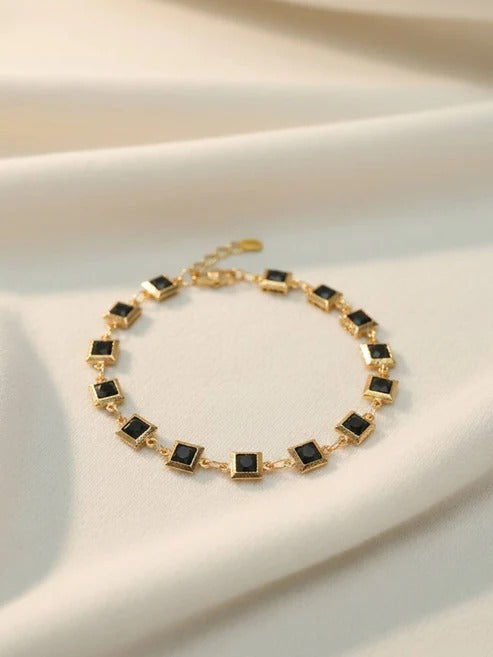 Square black stone gold bracelet