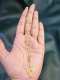 Yellow flower heart resin necklace