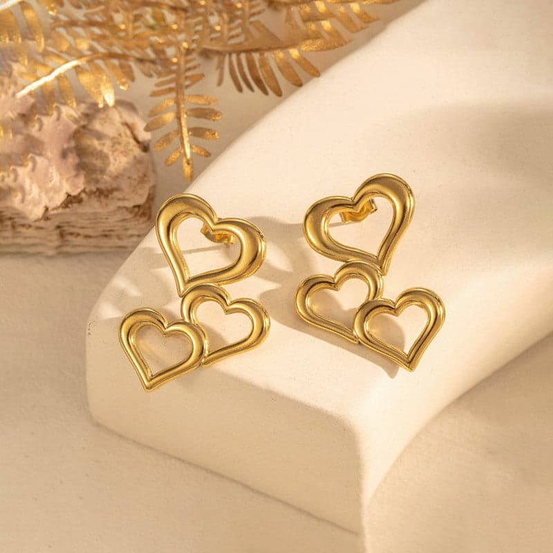 Triple heart gold drop earrings