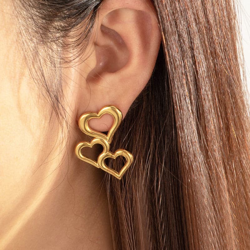 Triple heart gold drop earrings