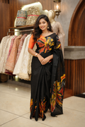 Black with orange flower design saree